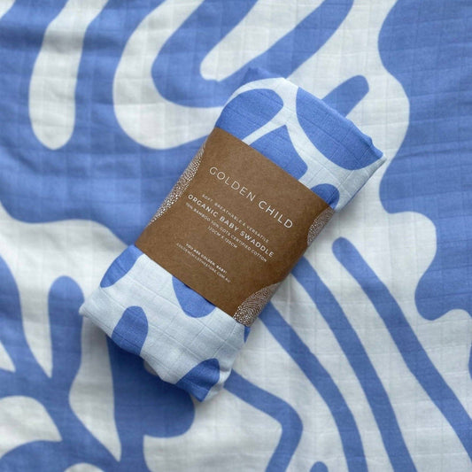 Golden Child Holiday Patterned Baby Swaddle: Golden Blue